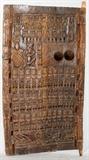 Lot#13, AFRICAN DOGON CARVED DOOR, H 67", W 52", MALI,Decorated with geometric figures in carved bas relief. Measures H. 67" x 52". Property from the Henry Stallings II Collection, Detroit, MI.