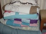Some of the vintage quilts and linens