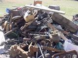 This only one of several LARGE piles of cast iron & steel scrap. These are actually car parts, engines, starters, manifolds, etc....1000's of pounds