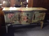 My personal favorite in the building!! beautifully  painted buffet