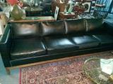 Mid Century Modern leather tuxedo coach