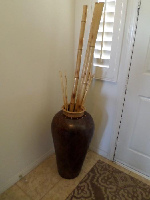Jug with bamboo rods