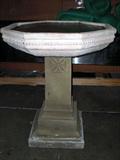 Birdbath with faux ice in it.