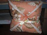Many, many pillows in all shapes, sizes and colors.