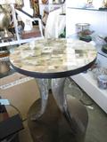 Longhorn Side Table. Perched on 3 Longhorns, the top is tiled with longhorn squares. $350.