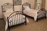 Wrought iron twin bed set.