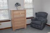 Chest of drawers with wicker front, swiveling recliner