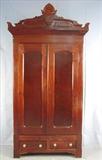 281 - Walnut Victorian wardrobe with fitted interior and carved crown 8ft 7in. T, 47in. W, 17in. D.
