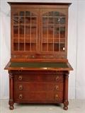 103 - Period mahogany empire secretary desk with original pulls and column front, 80in. T, 45in. W, 21in. D.