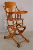 121 - Early popular primitive baby chair which converts to stroller, ca. 1890, 39in. T, 17i. W, 22in. D.