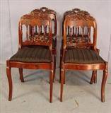 117 - Set of 4 empire mahogany saber leg dining room chairs with spindle back, ca. 1850, 32in. T, 18in. W, 16in. D.