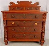 122 - Cherry and mahogany six drawer empire chest with back splash, 44in. T, 44in. W, 20in. D.