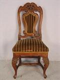 127 - Early walnut Victorian desk chair with carved back, 37in. T.