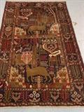 137 - Balochi rug , 3ft 9in. X 6ft 6in. with animals