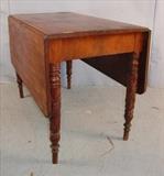 216 - Mahogany drop leaf breakfast table with acanthus carved legs, 29in. T, 40in. L, 22in. W.