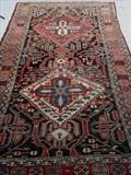 220 - Antique Persian hand made wool rug, 9ft 7in x 4ft 10in.