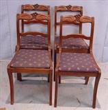 307 - Set of four mahogany dining chairs.