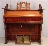 324 - Walnut Victorian pump organ.