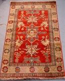 400 - Kazak small prayer rug, red and gold, 3ft 9in. x 2ft 4in.