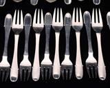 76 pc Georg Jensen Flatware 76 ozt without knives, Dinner knives approx 6 ozt, butter knives with hand hammered handles, blades marked Sterling 13.2 ozt