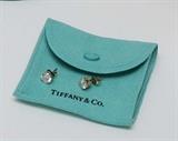 Tiffany & Co Diamond Stud Earrings with Yellow Gold Mountings, approx .5 Carat Each