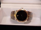 Movado Museum Watch. Purchase price $895.00. Still under warranty. $500.00