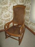 ANTIQUE HIGH BACK CANE ROCKING CHAIR  WITH SCROLL ARMS