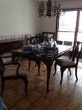 Mohagany dining room suite with table w/extension boards, custom table pads and 2 arm chairs and 4 side chairs (excellent condition!)