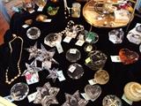 Lots of crystal paperweights.