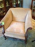 Tan vintage armchair.