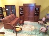 Ethan Allen media center, Ethan Allen sofa, vintage 10' x 16' sculptured rug, two striped vintage chairs. 