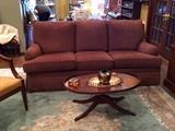 Ethan Allen sofa and vintage mahogany coffee table.