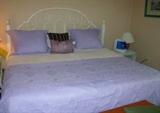 KING SIZE BED WITH MATTRESS/ BOX SPRINGS AND ALL LINENS