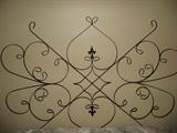Metal Wall Decoration that is currently used a headboard for Queen Bed