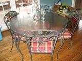 Round Glass Top Table with four chairs