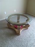 Glass topped coffee table