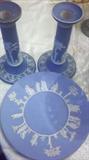 Bisque plate and candlesticks decorated with bas relief Grecian images.