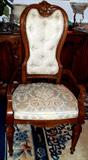 Front view of beautifully upholstered dining chair.