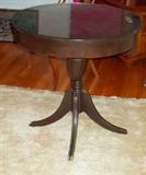 Skirted round table with drawer.  One of a pair.