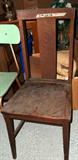 Single wooden desk chair.