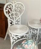 White wicker chair and side table.