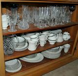 Royal Doulton dinnerware, Saraband pattern. Waterford stemware.