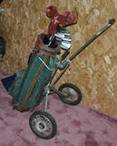 Vintage golf clubs and cart.