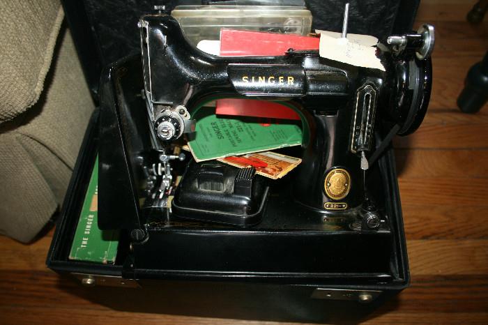 Vintage miniature portable Singer Featherweight 221-1 sewing machine with case and accessories