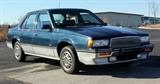 1987 Cadillac Cimarron Blue and Grey 4-Door Compact Sedan