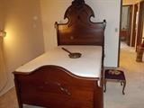 High-back antique bed 