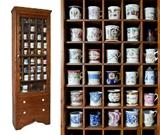 Lot 1099) Shaving Mug Display Cabinet, holds 40 mugs, 81 ¼” h.; Lot 1100) Collection of 27 Shaving Mugs.  William Henry Merner III Estate