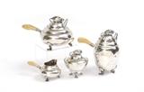 Lot 1001:  4 PIECE GEORG JENSEN BLOSSOM STERLING TEA SERVICE: Early 20th Century, made in Denmark, a;; on paw feet, 4 pieces to include 1) Coffee pot with handle, 7 1/2'' x 8'' x 6''. 2) Teapot with handle, 5 1/4'' h. x 9 3/4'' x 7 1/4''. 3) Covered sugar, 4 1/2'' h. x 4 1/4''. 4) Open creamer, 2 1/2'' h. x 6'' x 4''. 3 pieces with engraved dedication and dated 1926. Est. $10000/12000**
CONDITION: The occasional small ding. International shipping is not available on this lot.