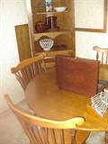 St. John dinning table with one leaf and matching pair of corner cabinets