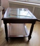 Solid wood end table, beveled glass top, caned bottom shelf